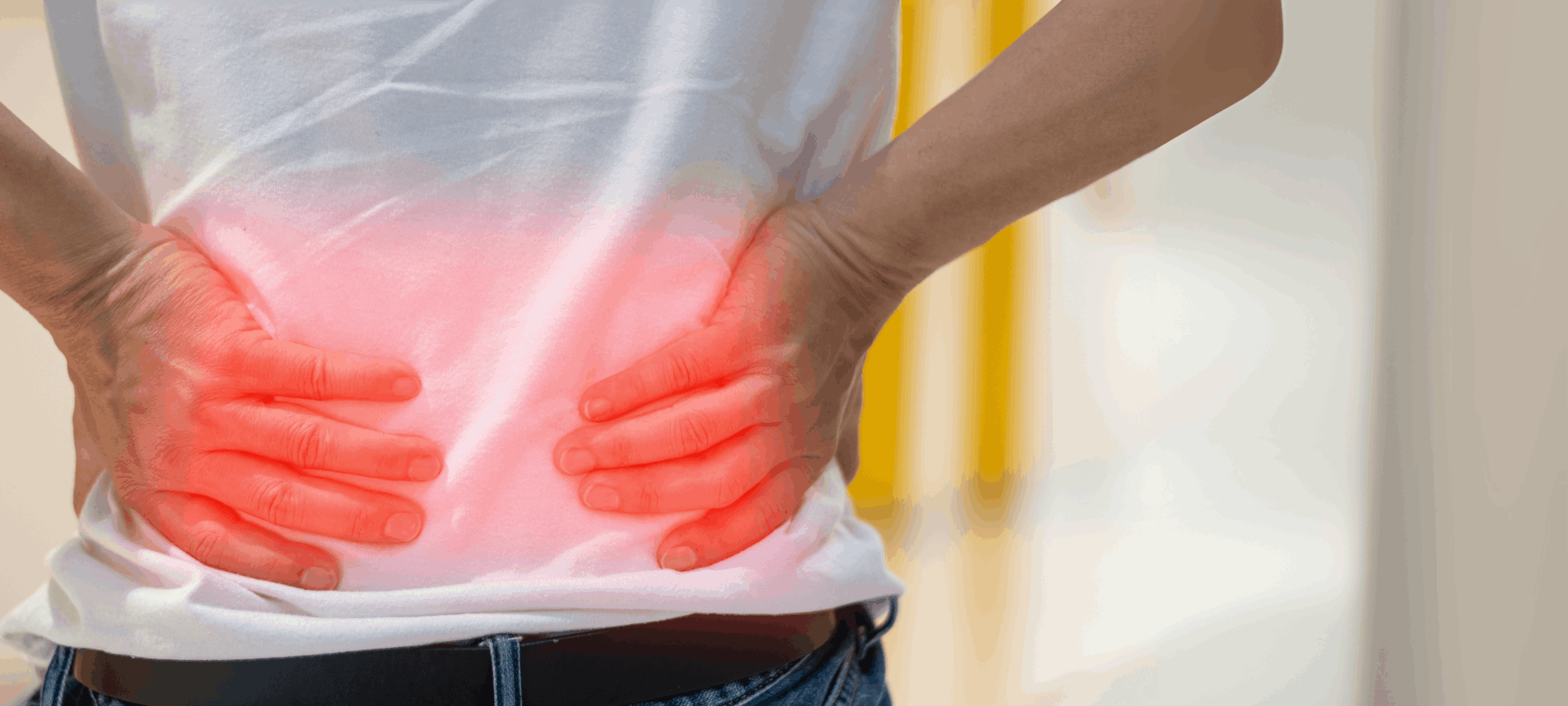 Man holding his back in pain