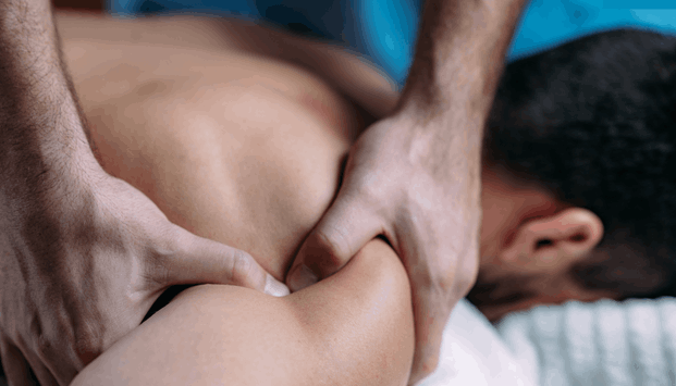A man getting Massage Therapy to Improve Sleep Quality & Insomnia